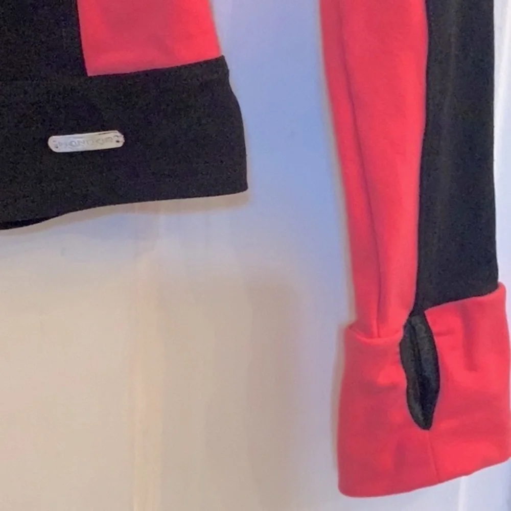 Mondor girls black and coral skating jacket in size 12 - 14